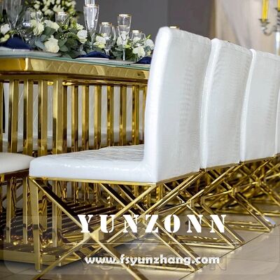 Giá tốt Chiếc ghế ăn da PU màu trắng sang trọng hiện đại với chân kim loại thiết kế khâu chéo cho nhà hoặc khách sạn phong cách giải trí trực tuyến